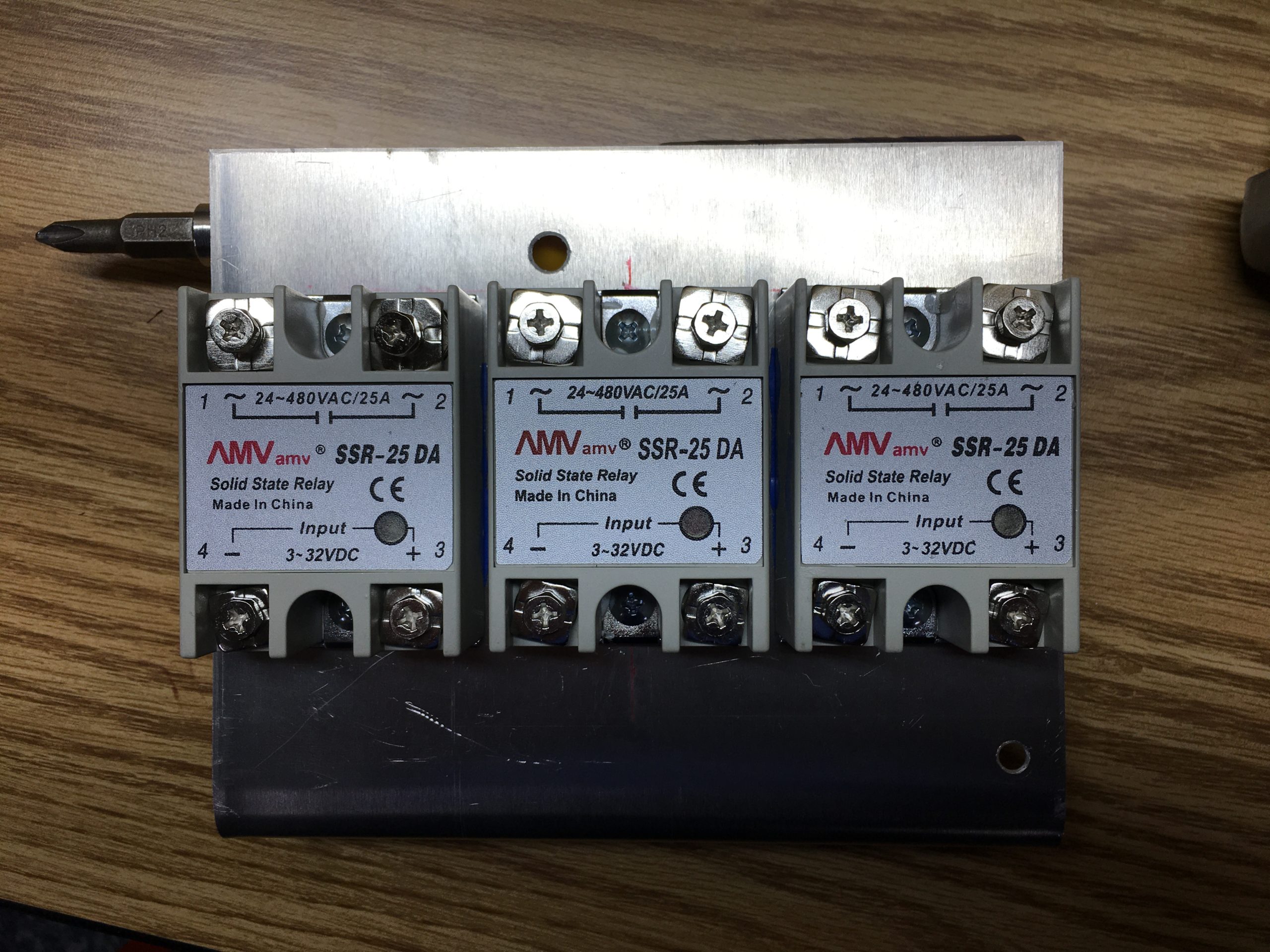 Solid state relays mounted on aluminum plate